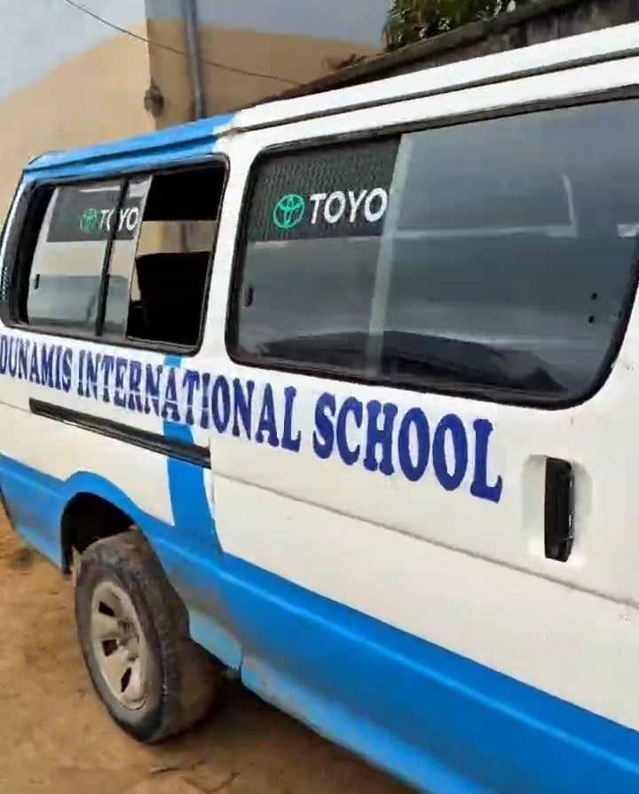 The blue and white Dunamis International School bus